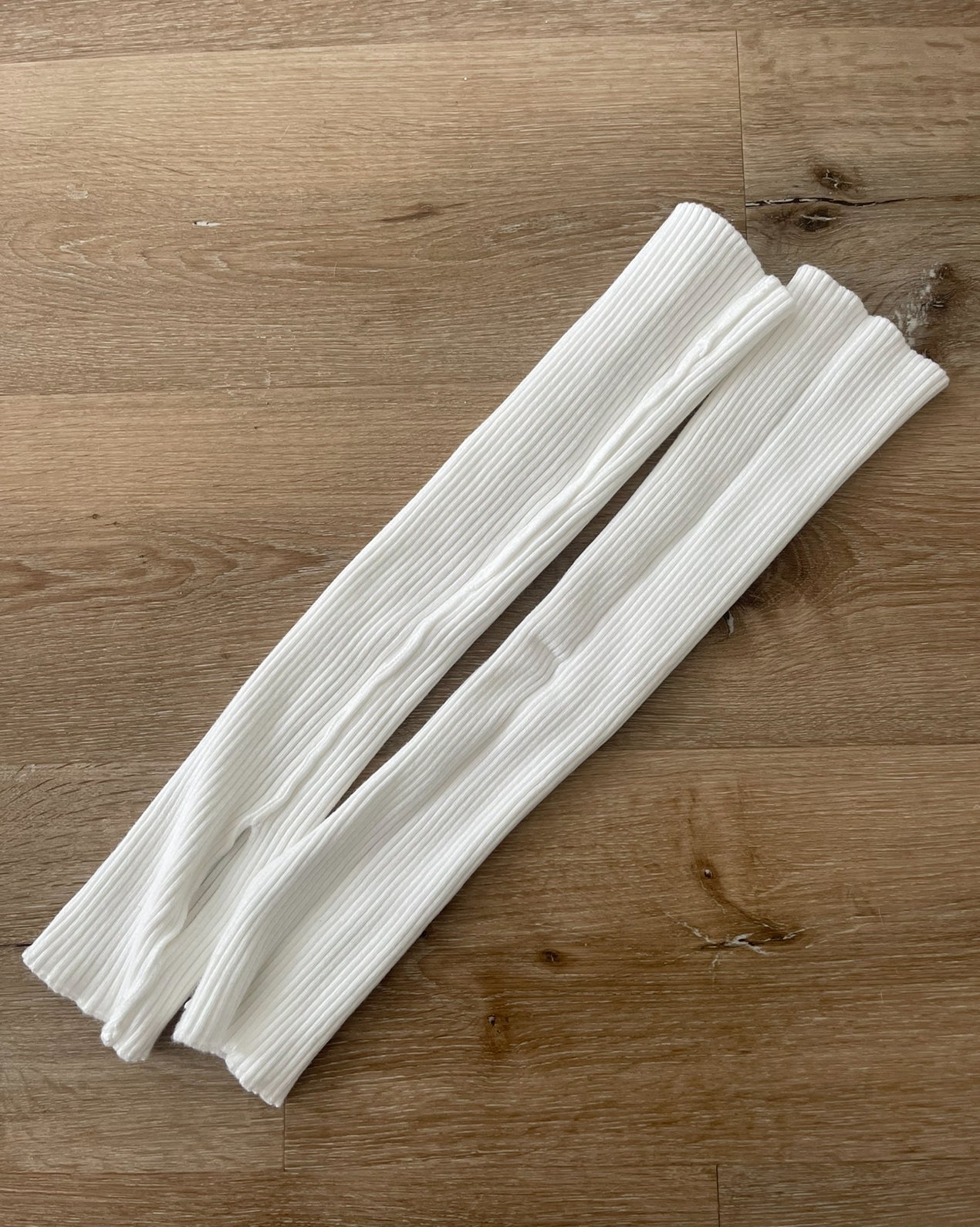 white stirrup leg warmer